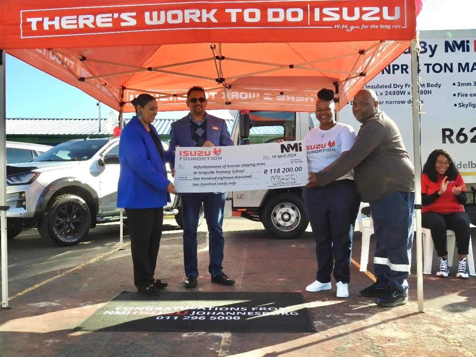 Afeera Khan (Principal of Grayville Primary School), Vivek Singh (Dealer Principal NMI ISUZU), Marcia Mayaba (Department Executive Dealer and Business Development), and Michael Ramagole (Chairman of School Governing Body)